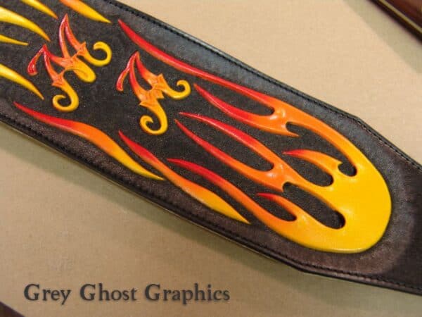 Picture of three color airbrushed leather flames.
